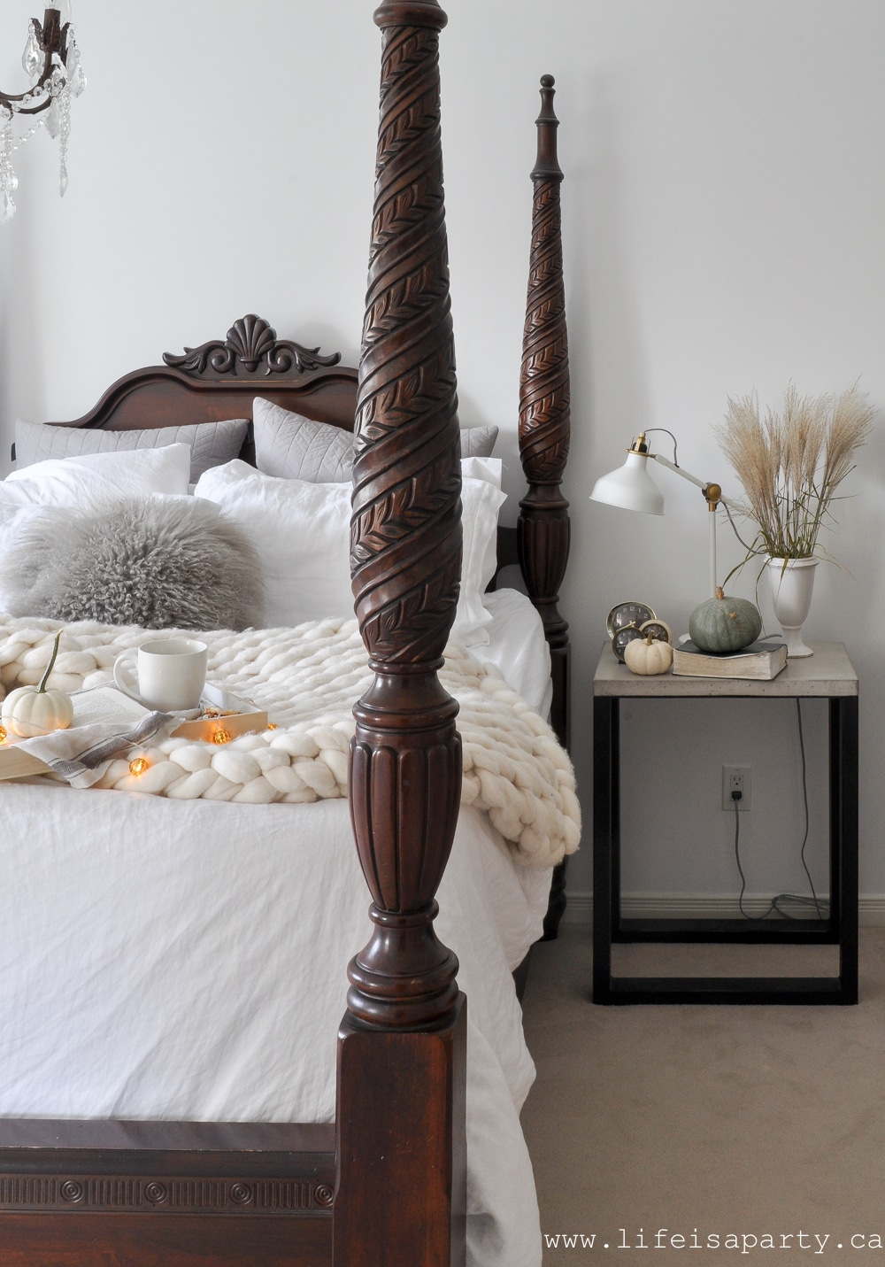 Cozy Fall Bedroom: 5 simple ways to make your bedroom cozy for fall, like candles, layers, books, natural elements, and neutral decor.