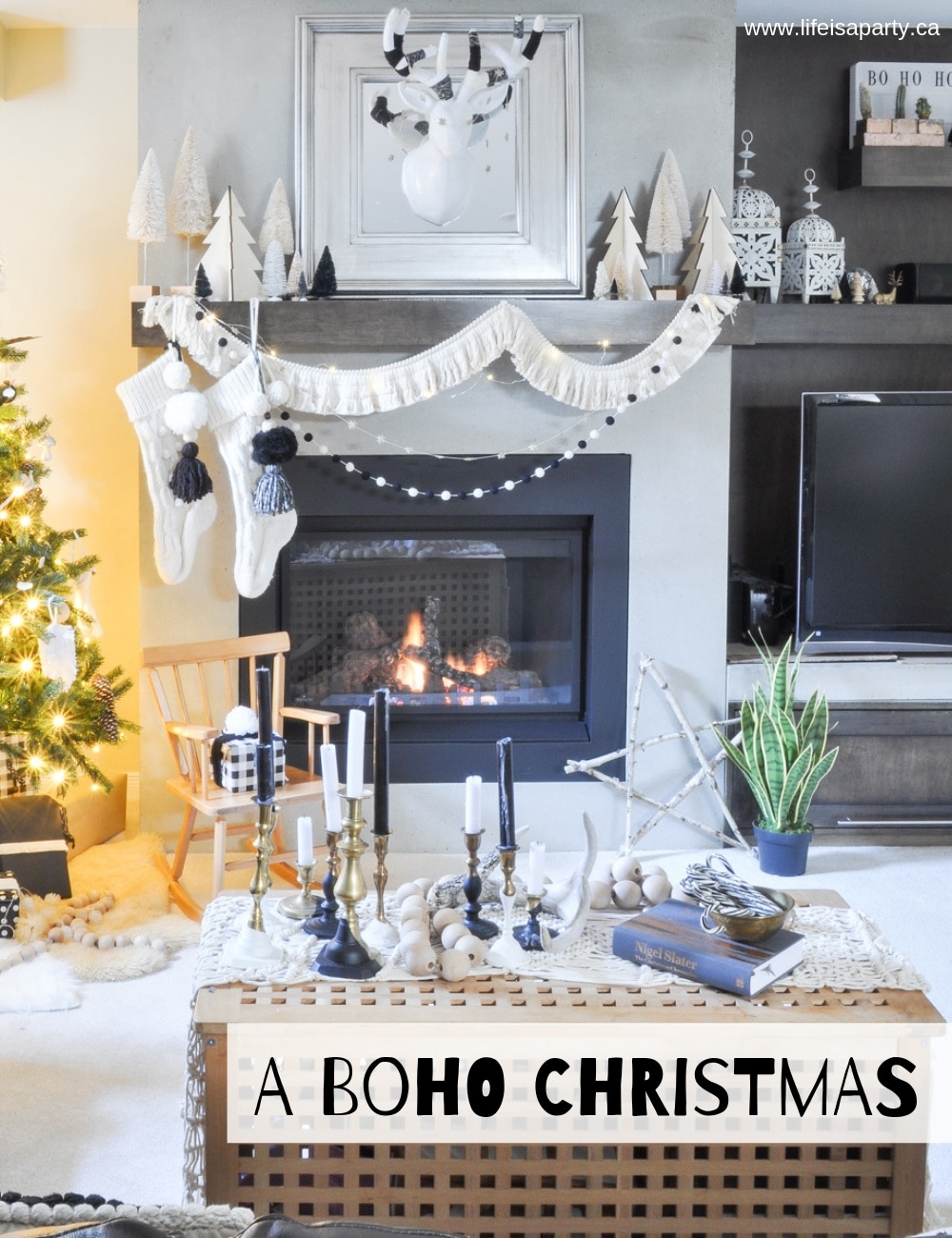 Boho Christmas Decor: decorated for Christmas with black and white boho including lots of texture, tassels, pom poms, brass, wood, and twinkle lights.