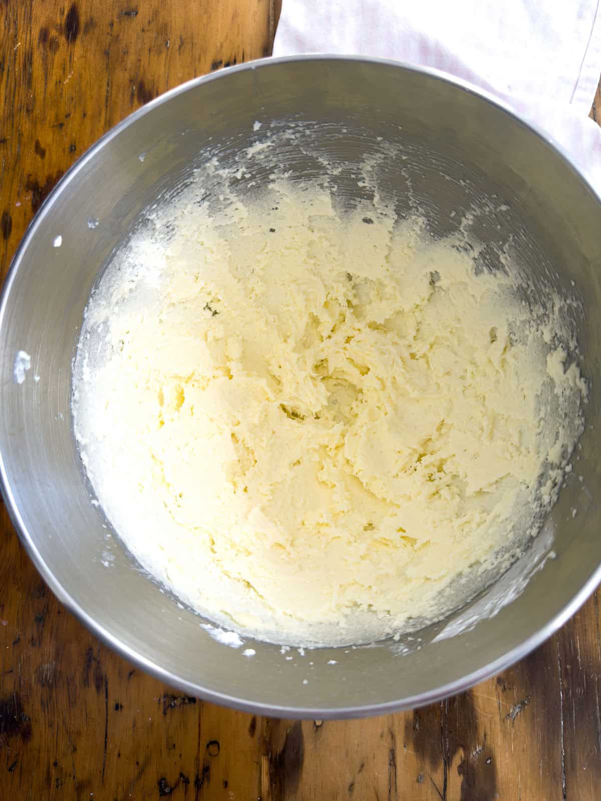 Butter and sugars creamed together in stand mixer bowl for cut out butter cookies