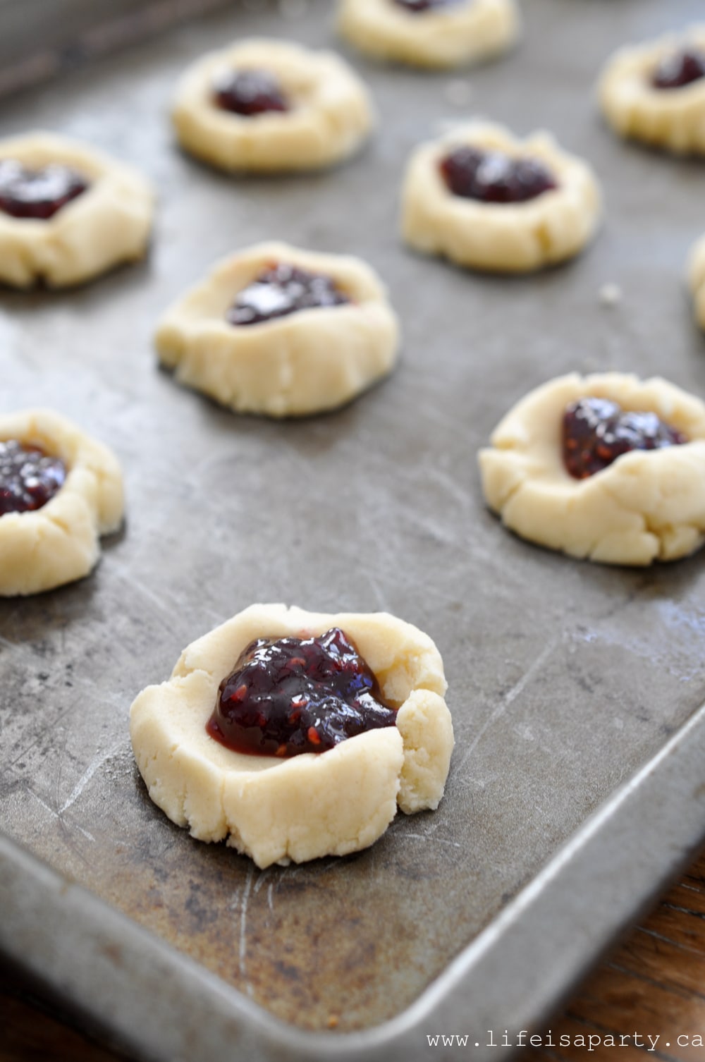 how to make Raspberry Almond Thumbprint Cookies