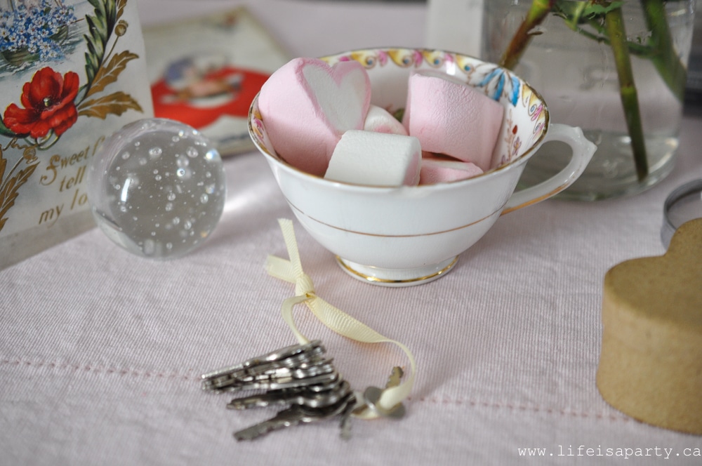 Valentine's Day Table with heart shaped marshmallows and vintage keys