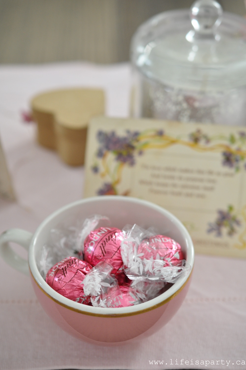 chocolates in a vintage pink teacup for Valentine's Day