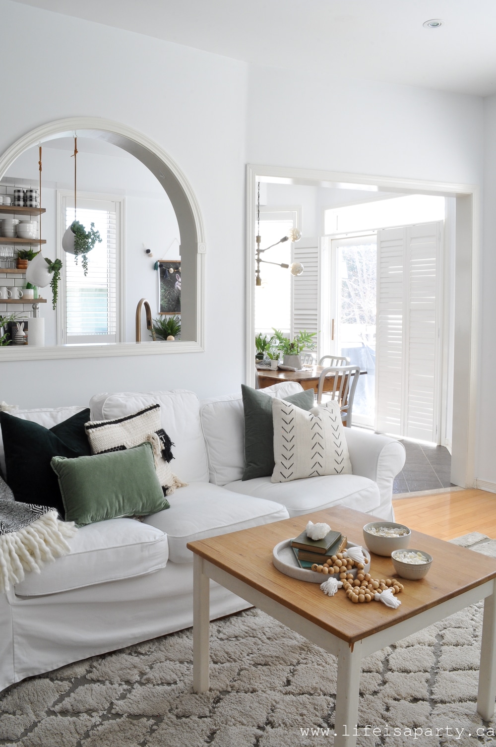 black, white and green decor for spring living room