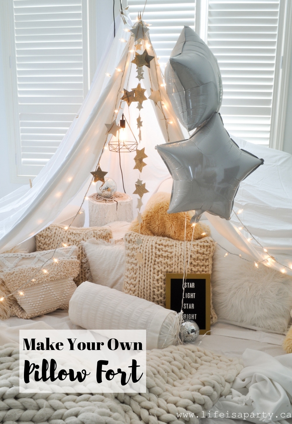 How To Build A Pillow Fort -make a magical pillow fort with fairy lights and starry decorations, and star themed snacks for family night or date night.