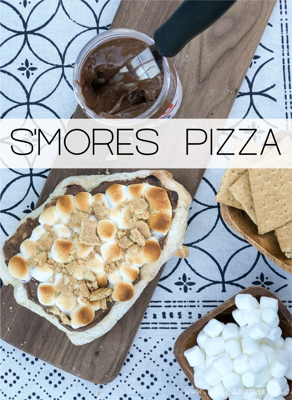 S'mores Pizza: For this smores pizza recipe use nutella, marshmallows and graham crackers on your pizza for a perfect summer treat.