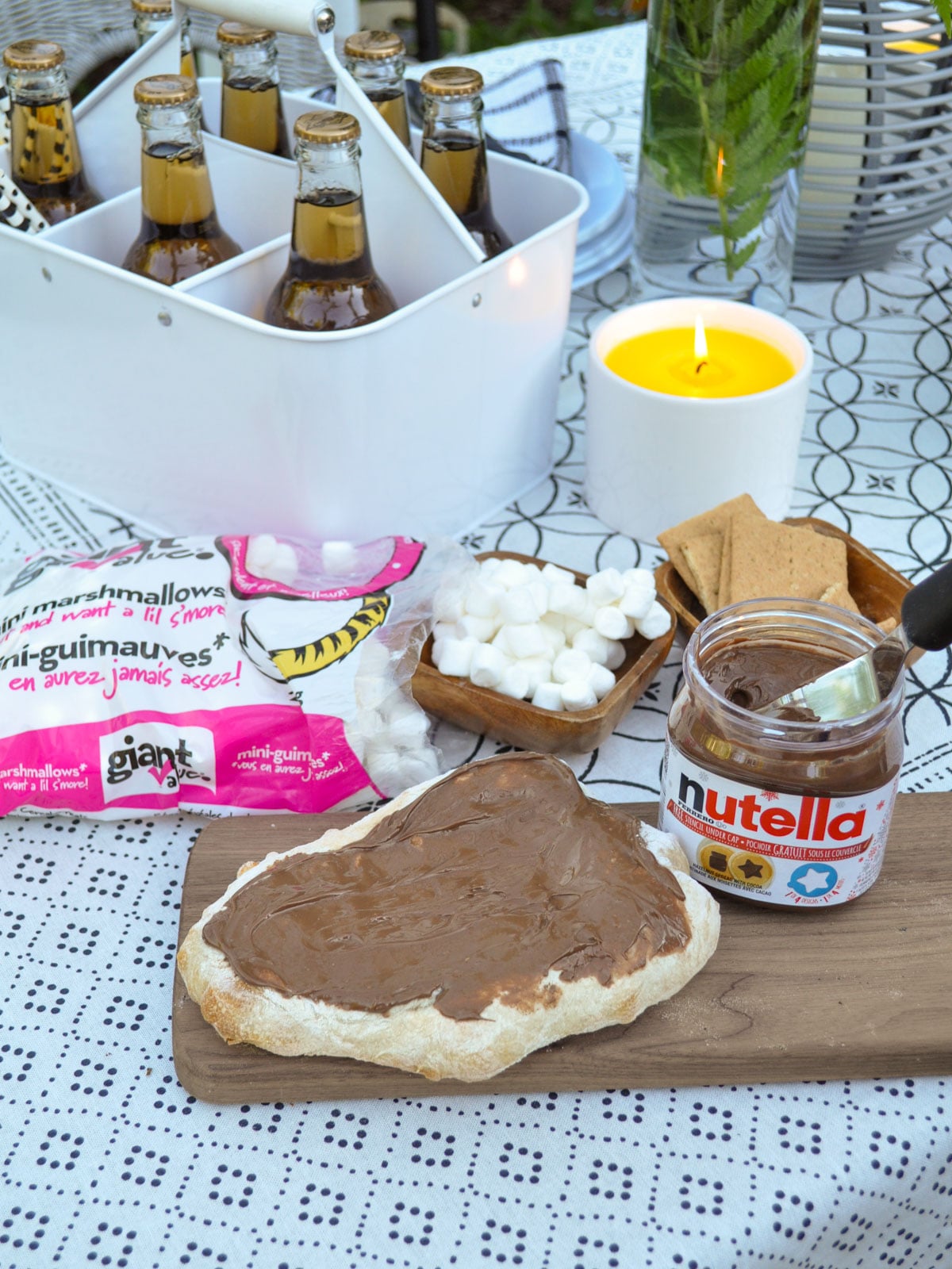Pizza crust spread with Nutella hazelnut spread before adding marshmallows.