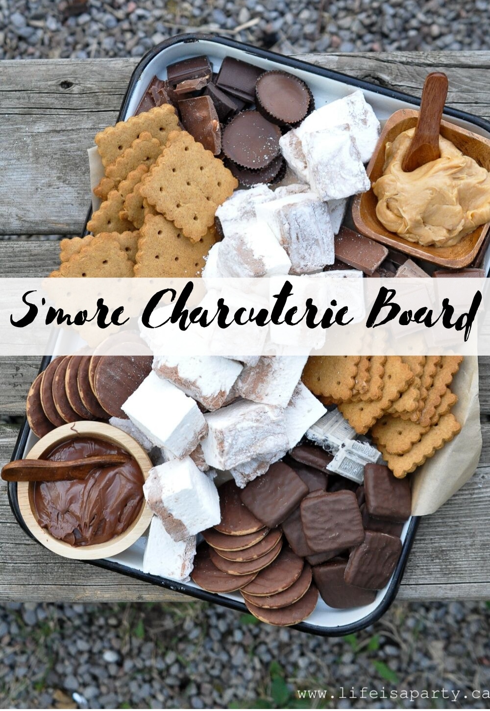S'more Charcuterie Board: this s'more themed dessert board is perfect as a summer treat around a campfire, or for your camping themed party.