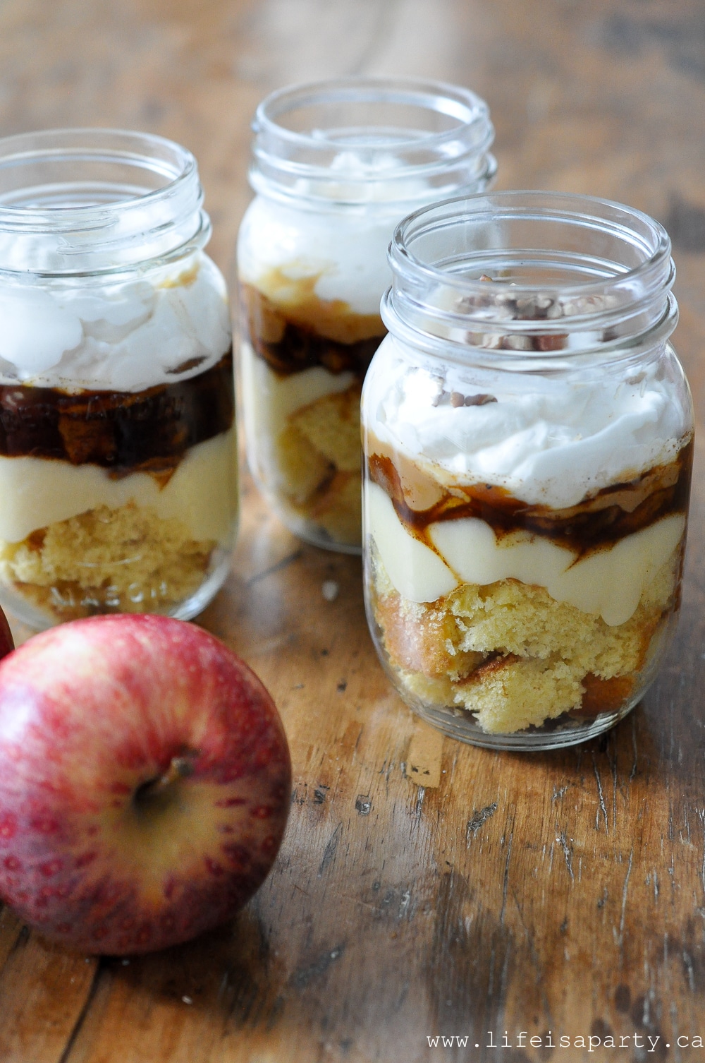 Caramel Apple Trifle: layers of cake, caramel, cooked apples, custard, and whipped cream create the perfect fall dessert.