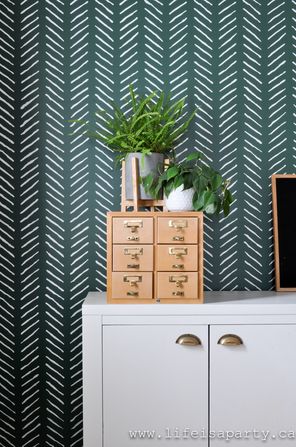 Green Feature Wall: the perfect shade of green paint, and the hand drawn chevron stencil create the an amazing feature wall.