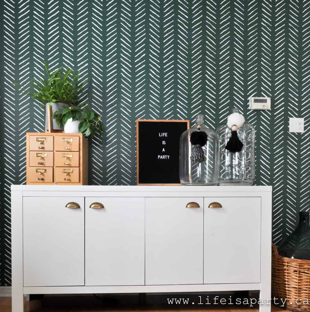 Green Feature Wall: the perfect shade of green paint, and the hand drawn chevron stencil create the an amazing feature wall.