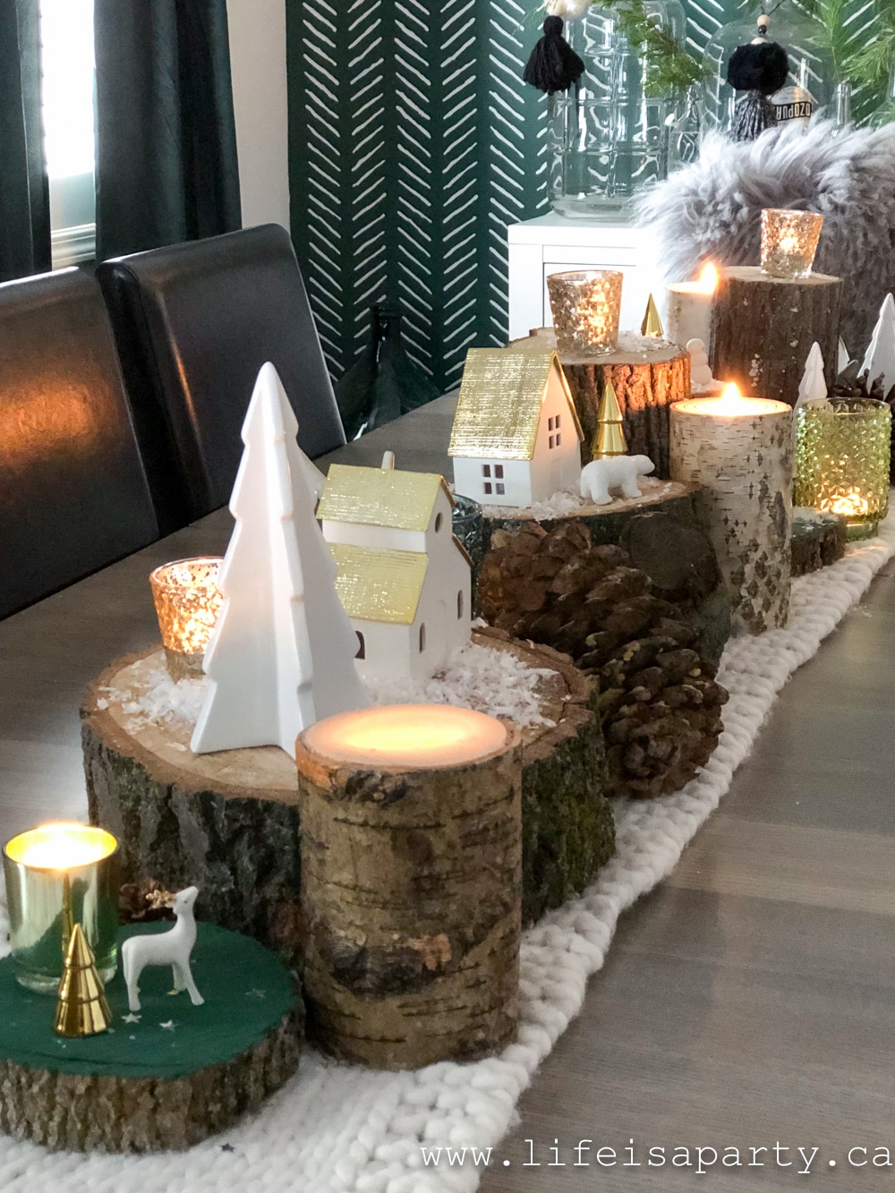 Christmas centre piece with rustic materials and green Christmas decor.