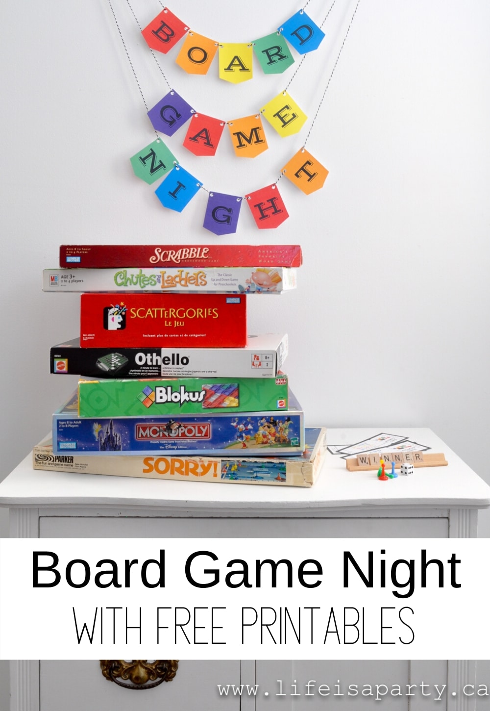board game night banner and stack of board games