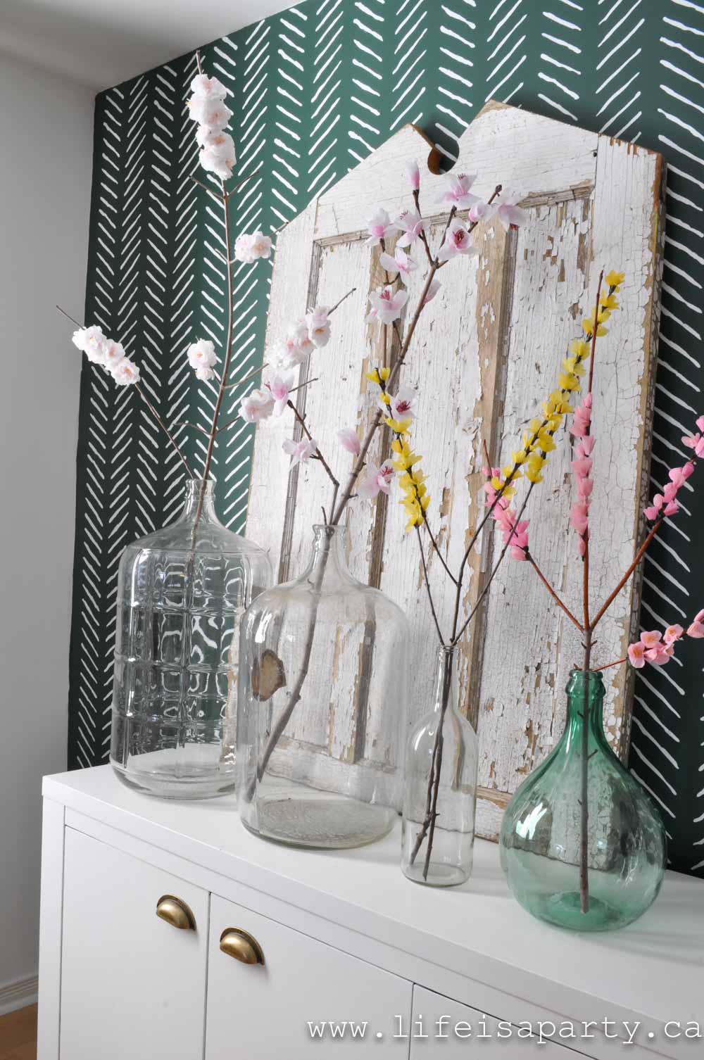 DIY crepe paper flowering branches spring flowers in vintage jars