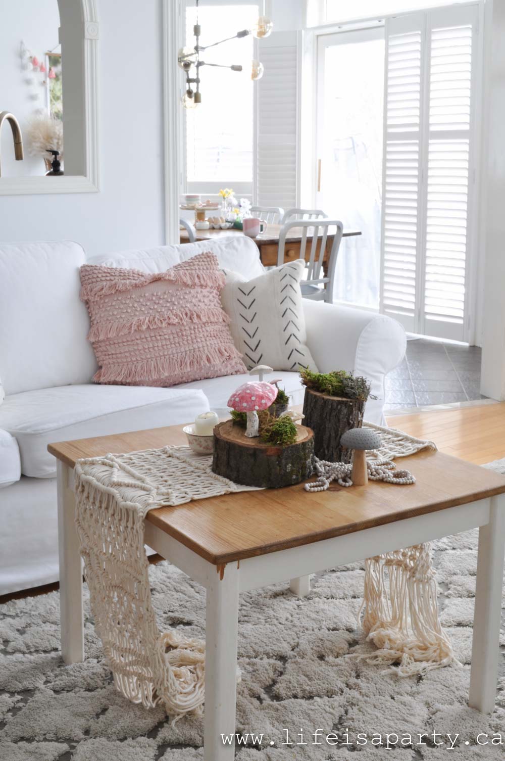 Spring Home Tour: pretty pastel rainbow colours, butterflies, mushrooms, and crepe paper flowers create the most beautiful spring home tour.