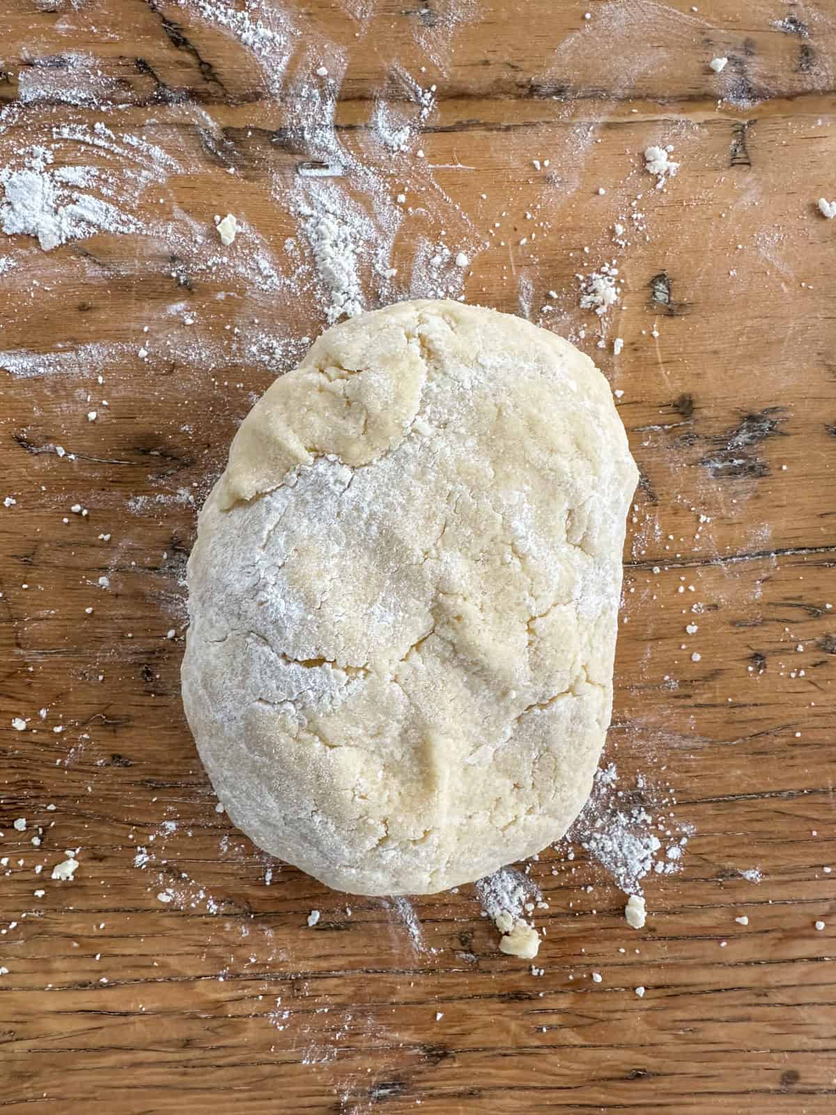 Scone dough formed into a large bowl, ready to roll out.