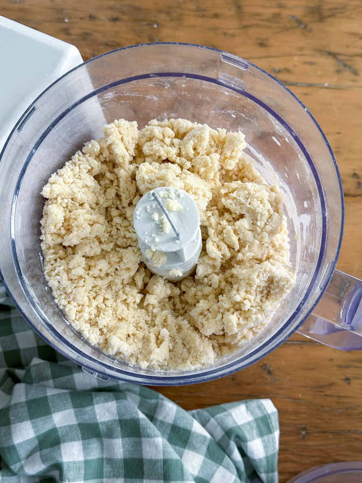 Scones fully combined in a food processor.