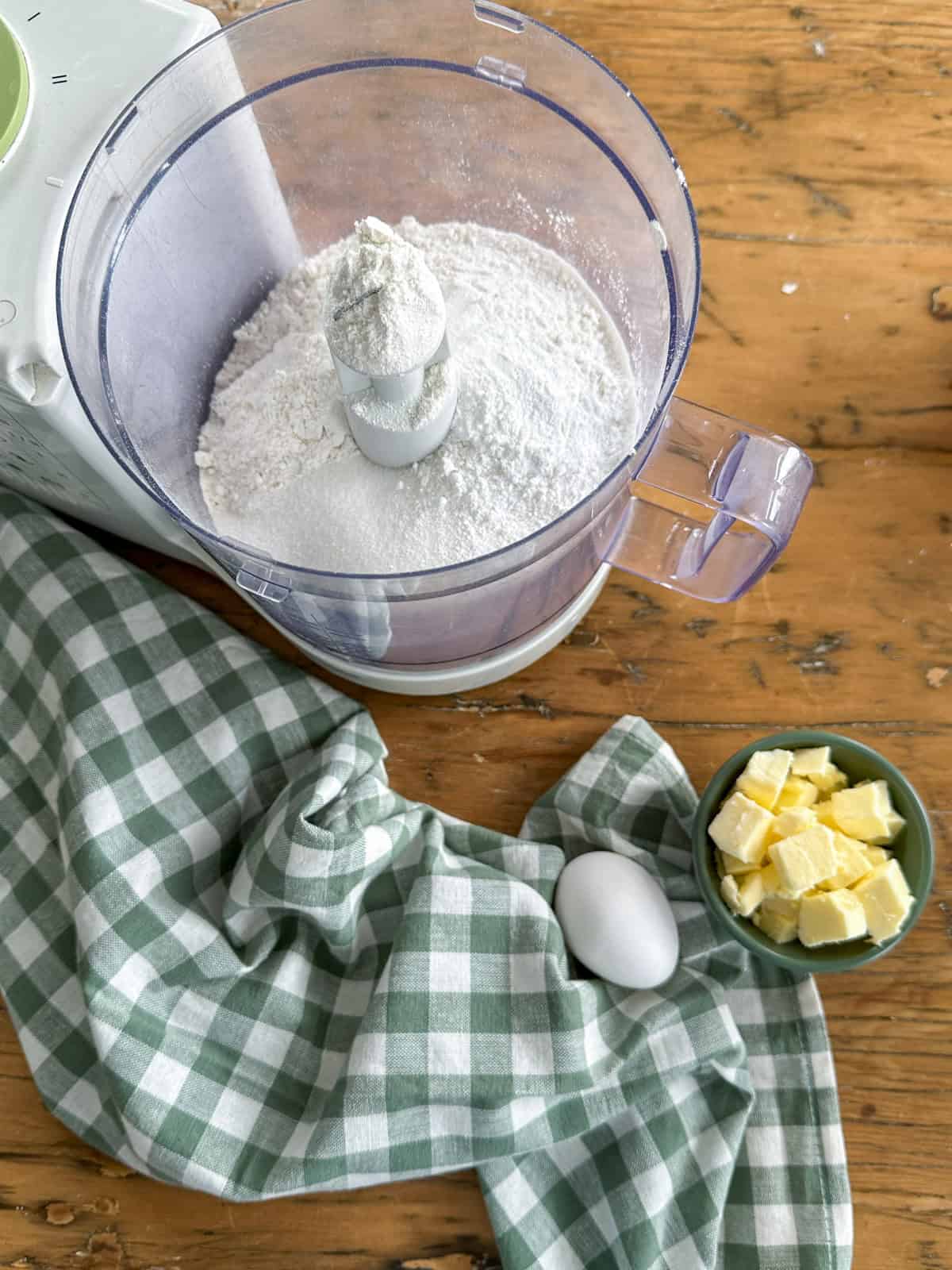 Dry ingredients of scone recipe in a food processor.