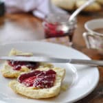 Easy food processor scones on a plate with jam.