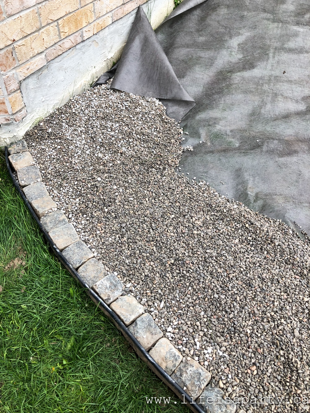 how to lay pea gravel over grass