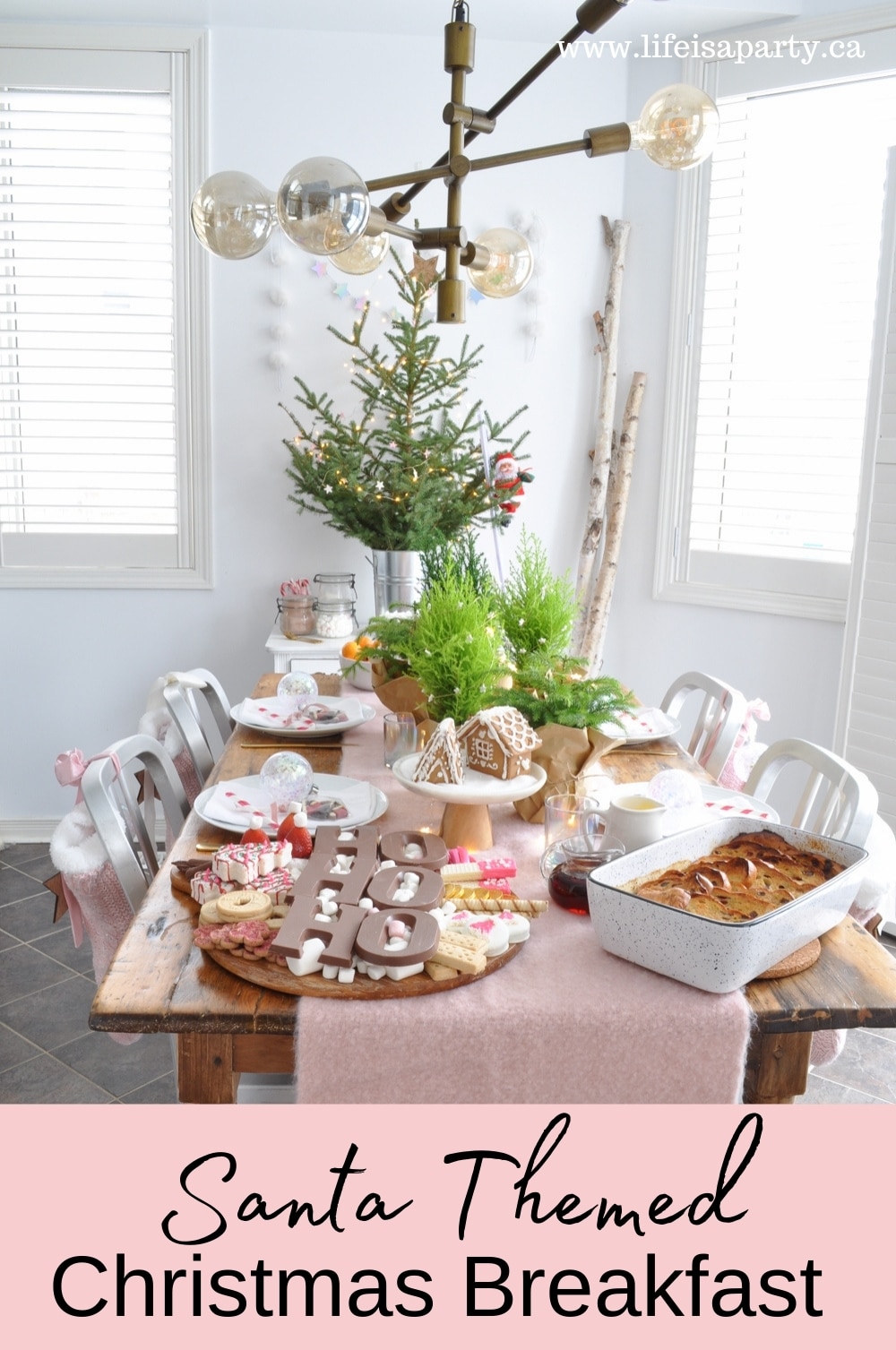 Santa Themed Christmas Breakfast Ideas: a beautiful pink tablescape, with stockings hanging on the chairs, a menu, and matching pjs.