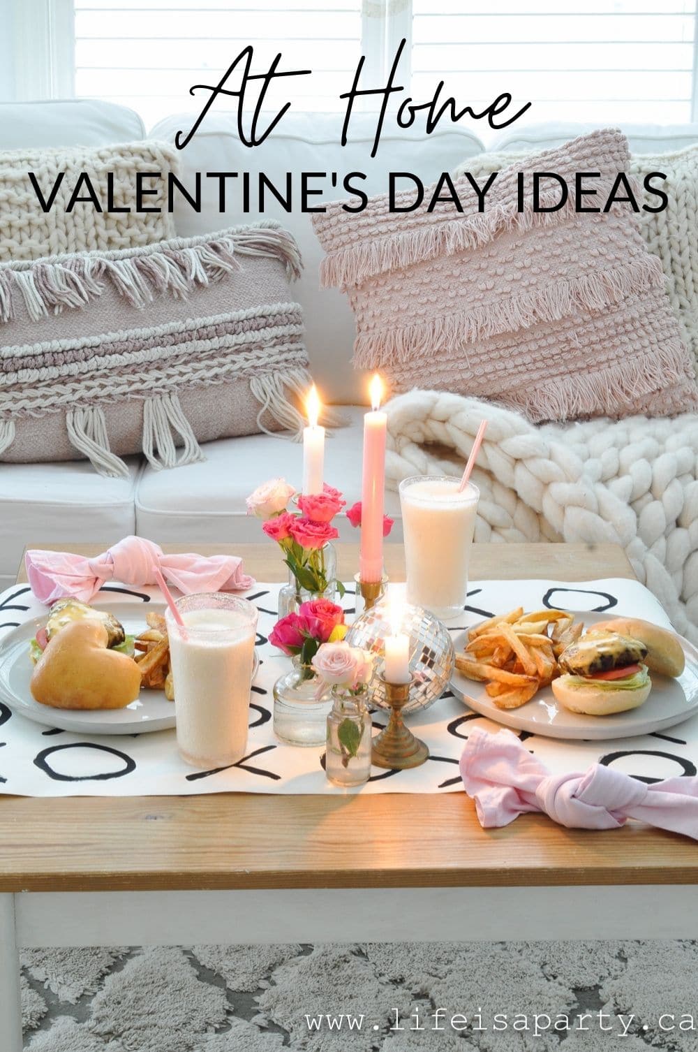 At Home Valentine's Day Ideas: a cozy night in with a casual coffee table setting and heart shaped burgers, fresh cut fries and milkshakes.