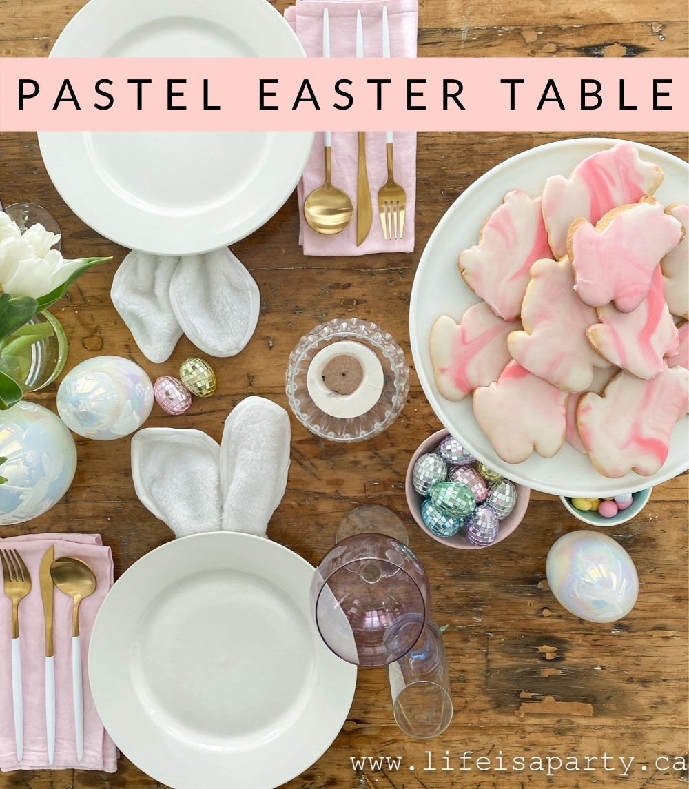Easter Table Ideas: bunny plates and chairs made from dollar store bunny ears and tails add some whimsy to this pastel & iridescent table.