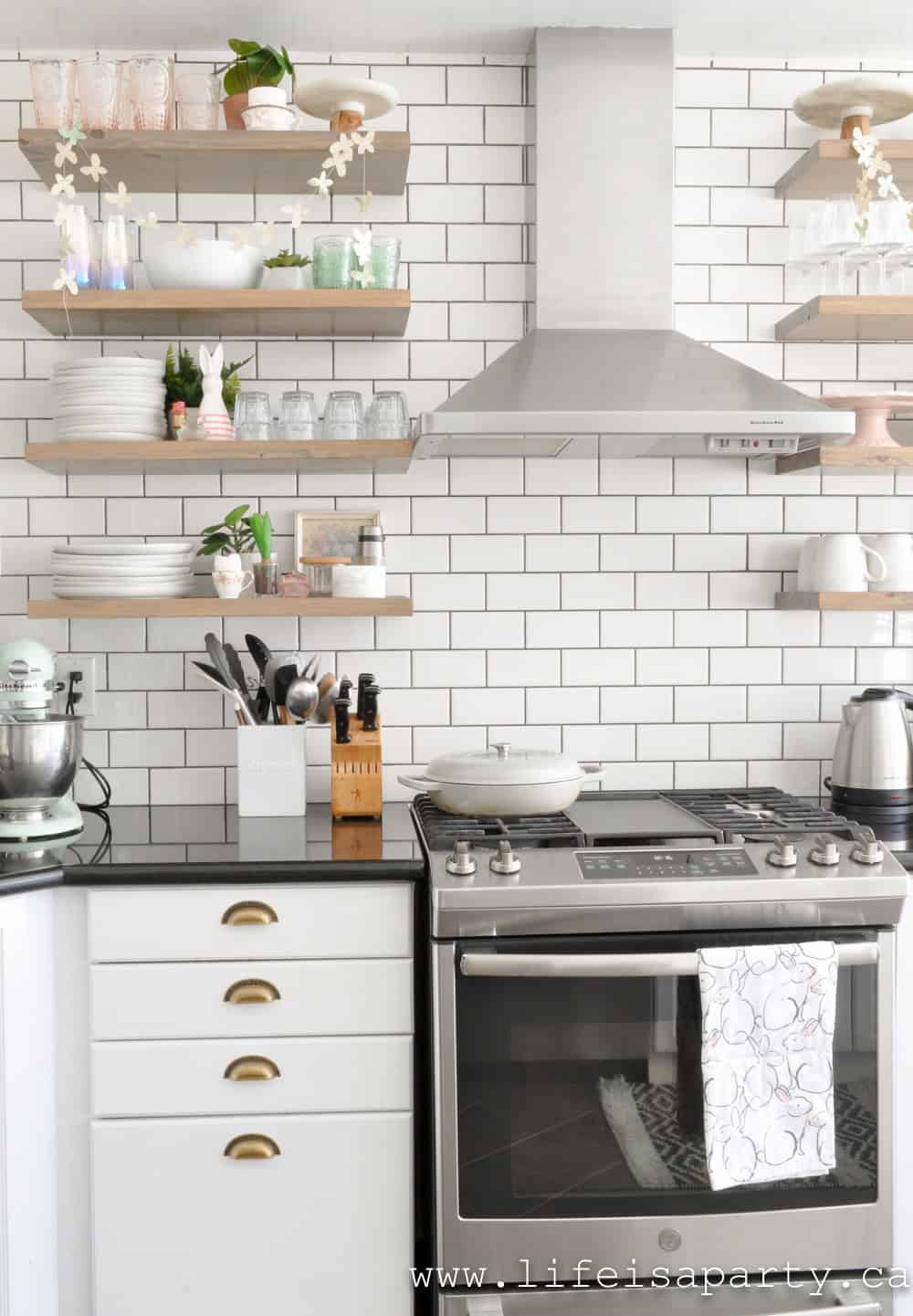 open kitchen shelves decorated for spring