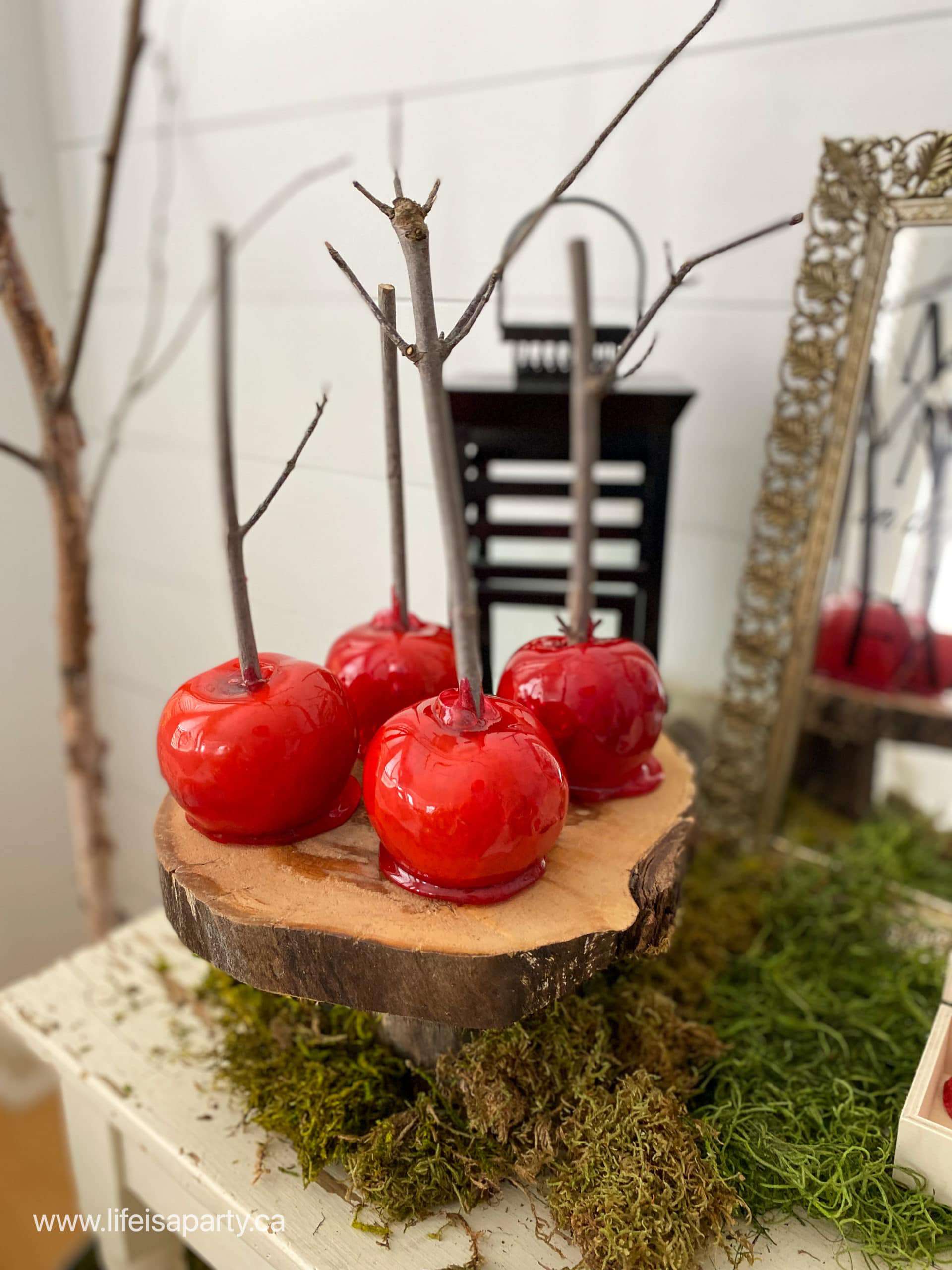 Snow White inspired red candy apples.
