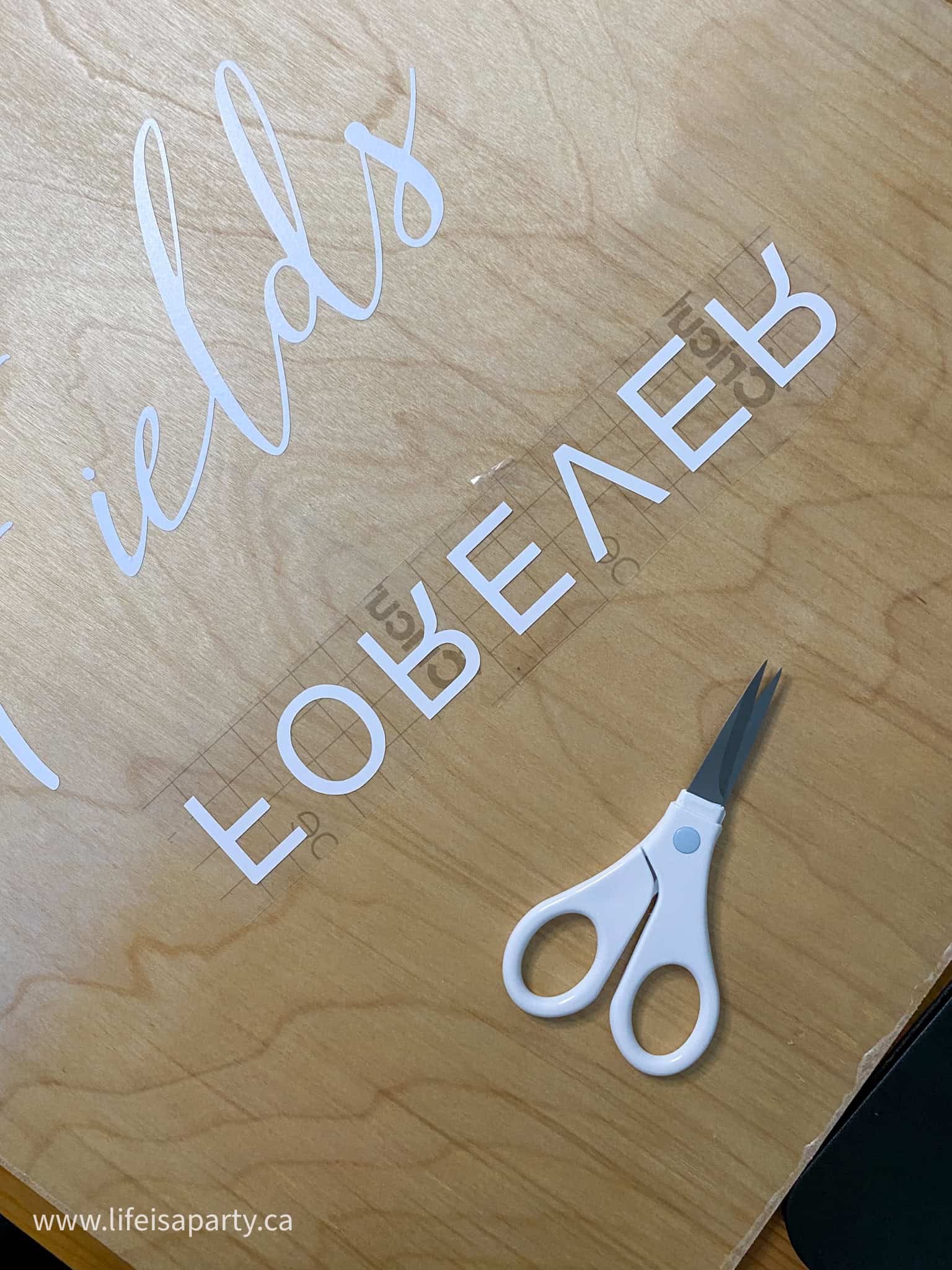 adding Cricut vinyl to plywood