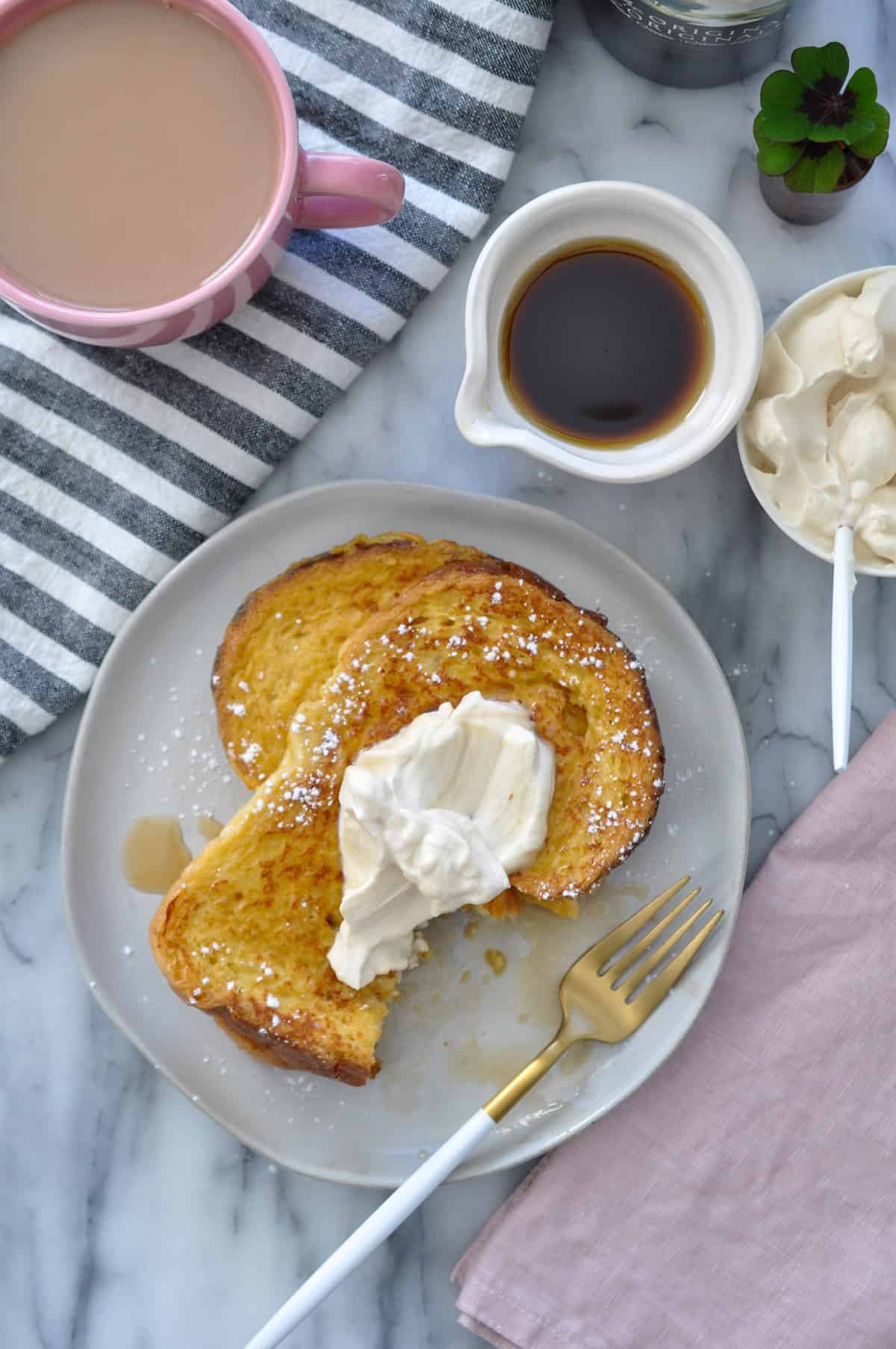 Baileys French toast with Baileys whipped cream and syrup.