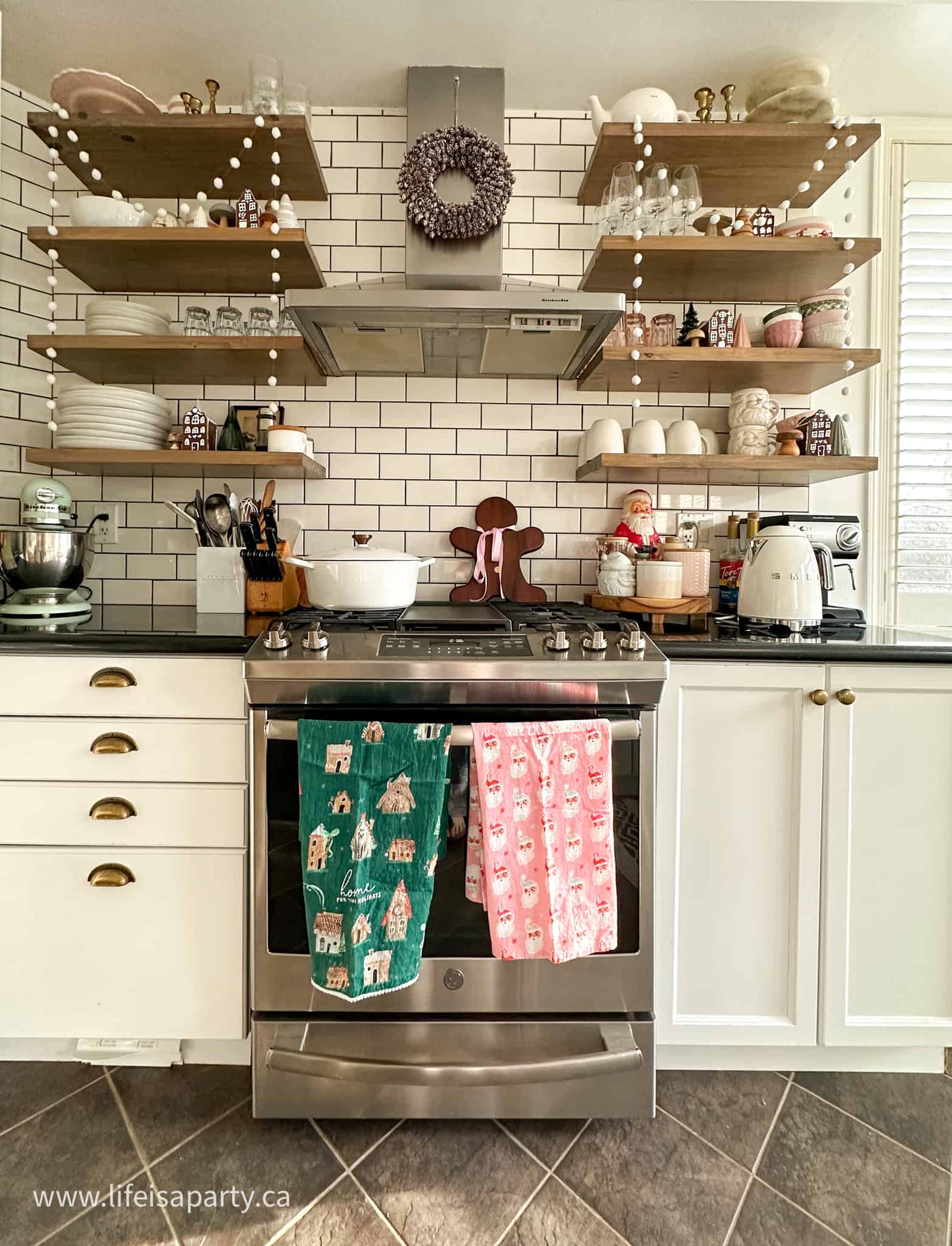 open kitchen shelves decorated for Christmas