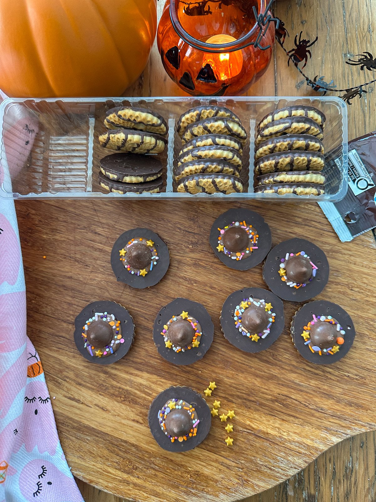 Witch hat cookies made with chocolate round cookies and Hershey's Kisses.