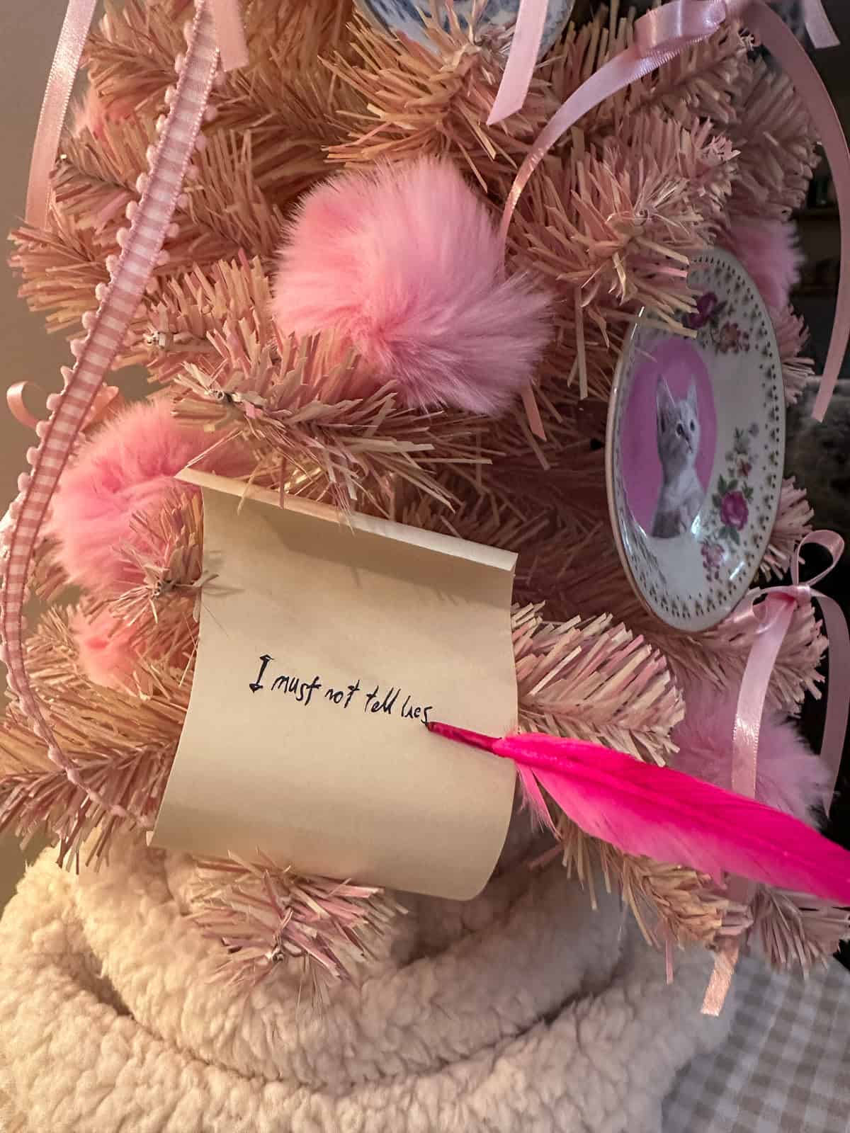 I must not tell lies DIY Harry Potter Christmas ornament with pink quill on Umbridge Christmas tree for Harry Potter themed decorations.