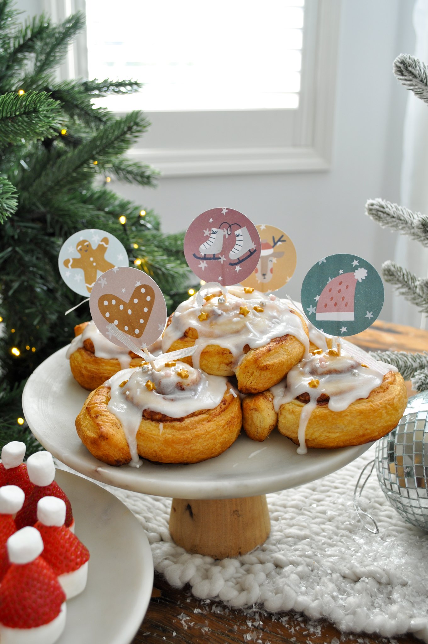 Free printable Christmas cupcake and food picks for an elf on the shelf arrival breakfast.