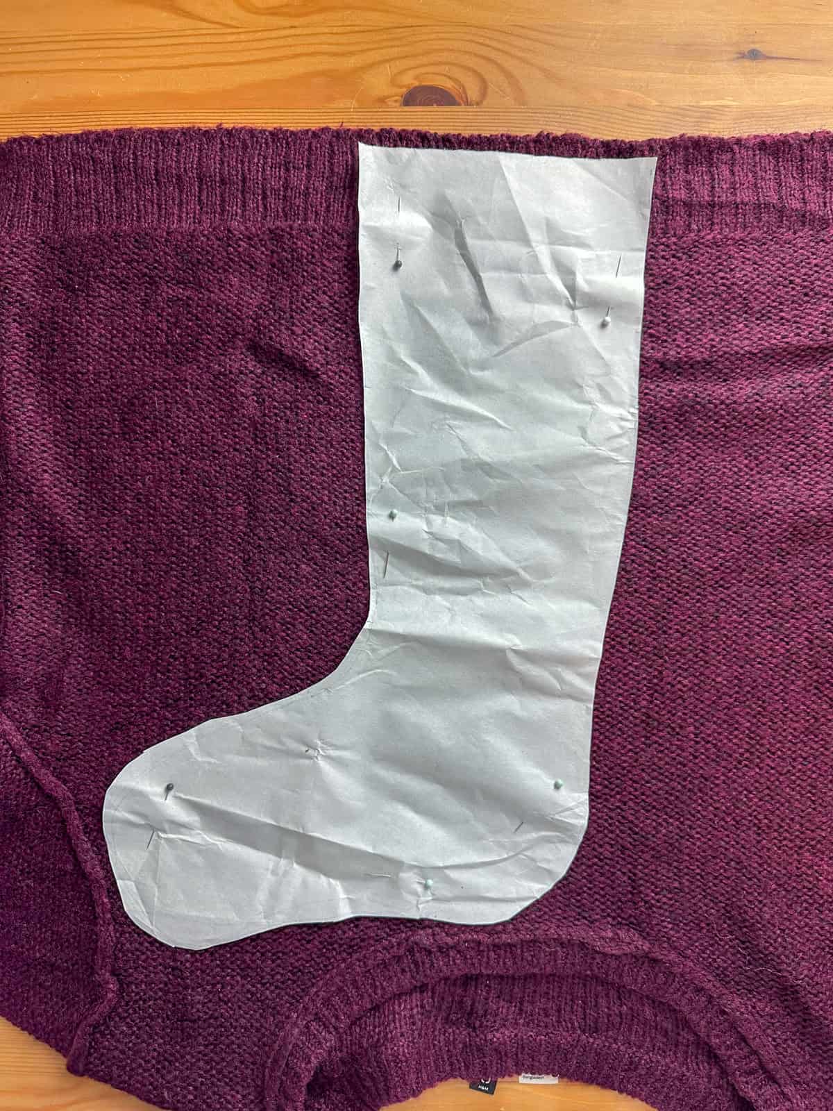 DIY Harry Potter stocking pattern on thrifted sweater for Harry Potter Christmas decorations tutorial.