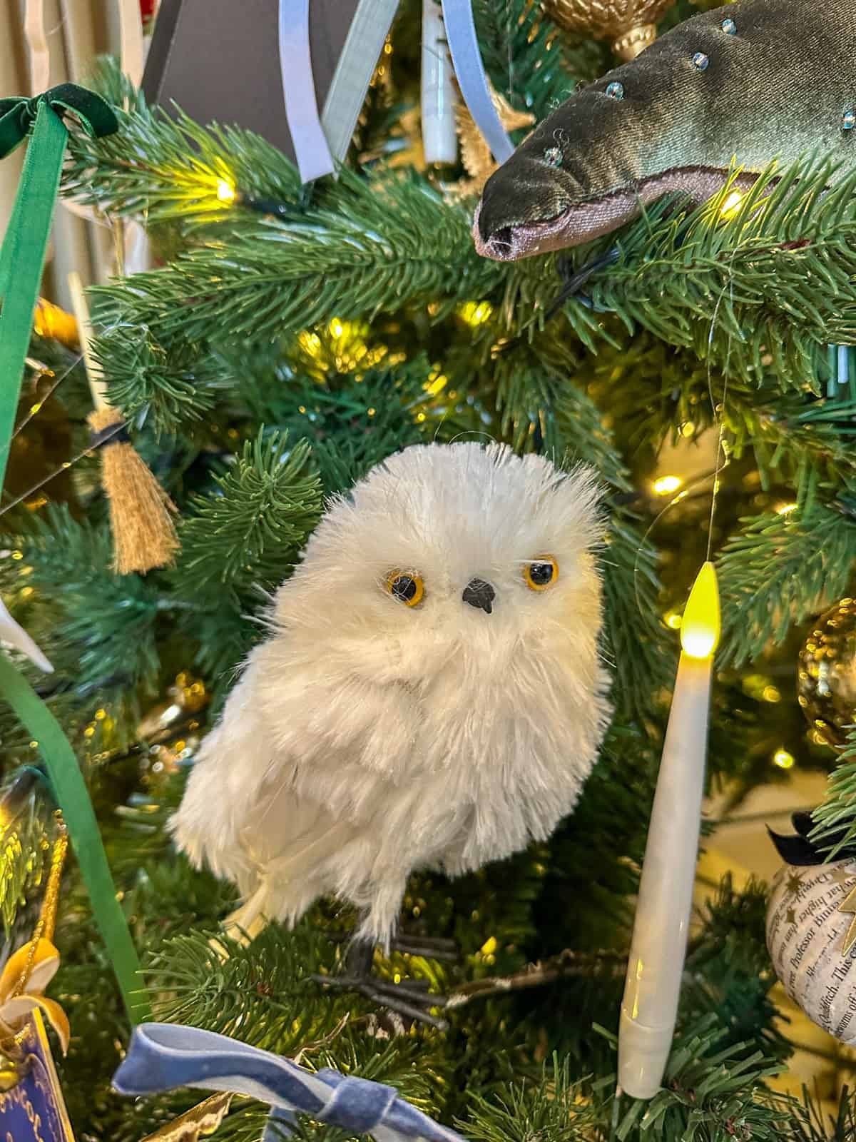 White owl oranment on a Harry Potter themed Chrismas tree.