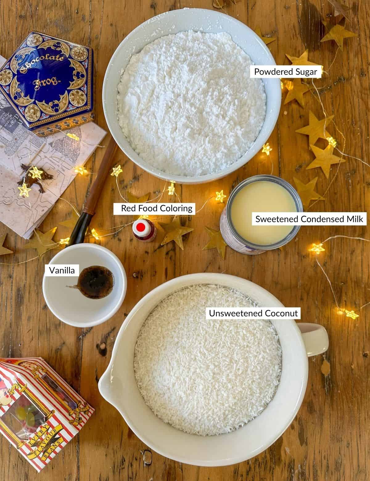 Coconut ice ingredients on in bowls on a table.