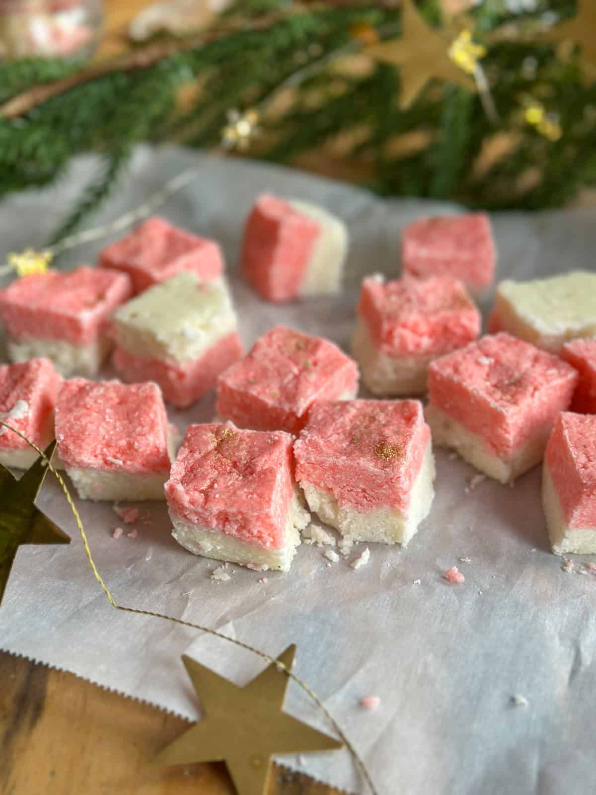 Homemade coconut ice recipe, cut into squares.