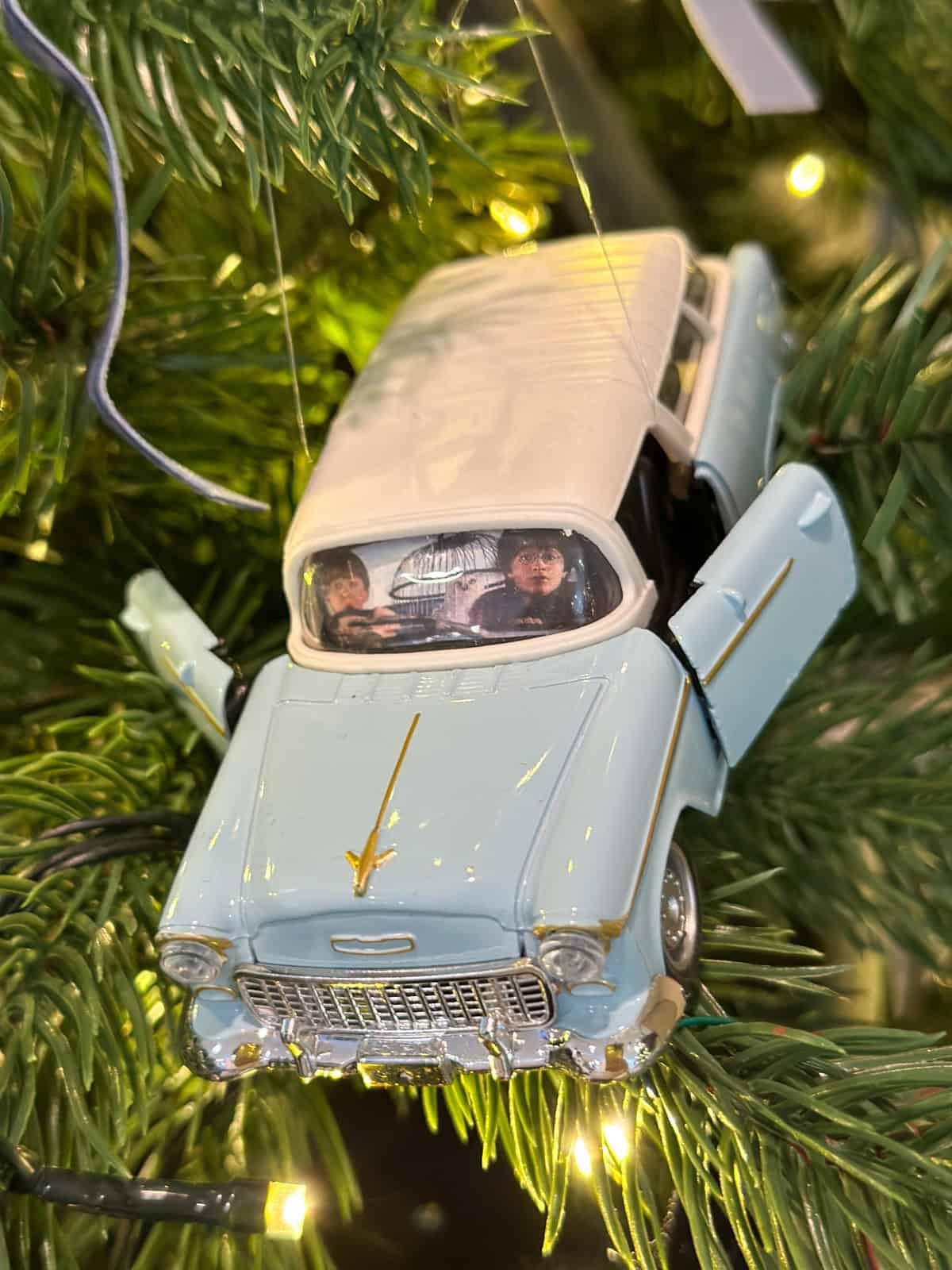 Flying car ornament with Harry and Ron in windshield for Harry Potter Christmas tree decorations.