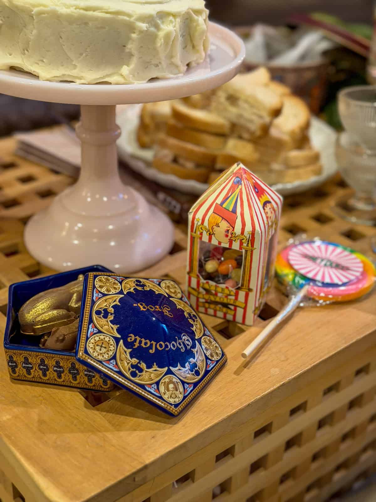 Chocolate frog, Bertie's Every Flavor Beans, and a Honeydukes lollipop at a Harry Potter Christmas party.