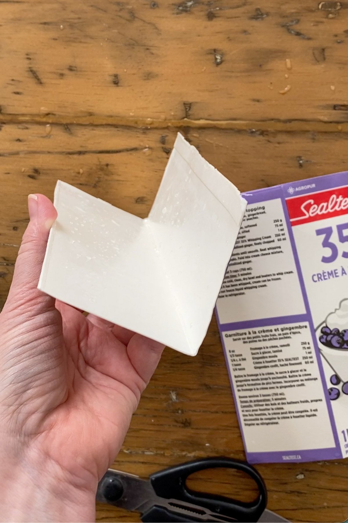 V-shaped milk carton mold for making heart-shaped hard boiled eggs.