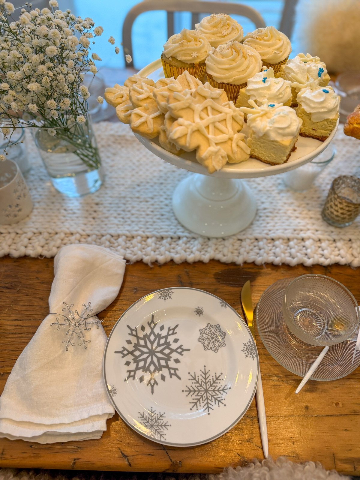 Snowflake plates and napkin rings for a winter tea party.
