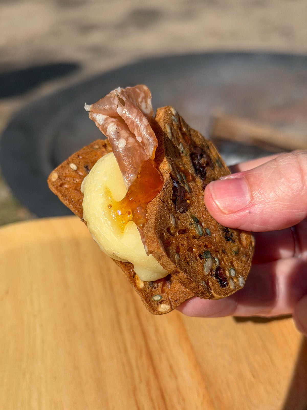 Babybel cheese with salami and fig jam on crackers.