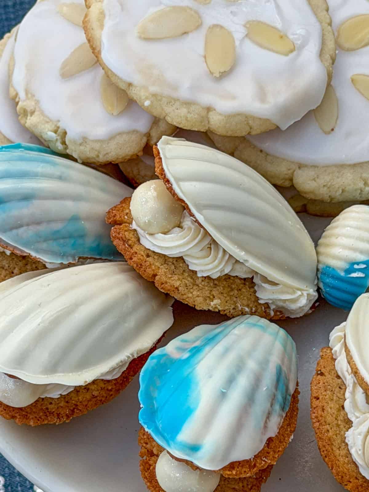 White chocolate seashell madeleine cookies with pearl centers.